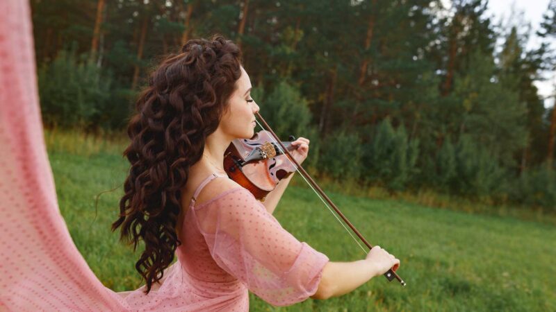 Beautiful Violinist Girl In Pink Dress Walking In       Utc