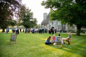 Audience gathering on Chapel Lawn