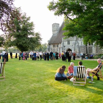 Audience gathering on Chapel Lawn