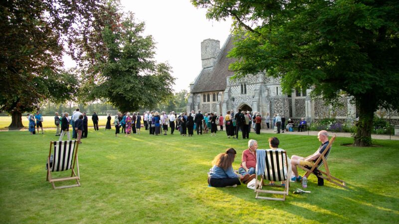 Audience gathering on Chapel Lawn