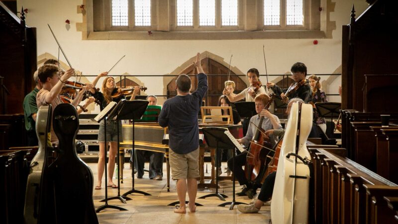 Steven Devine rehearsing with the Baroque Orchestra