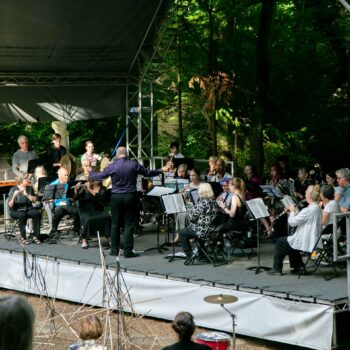 Wind Band in concert at the Theatre in the Woods, directed by Steve Dummer